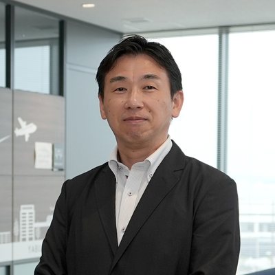 入佐学さん